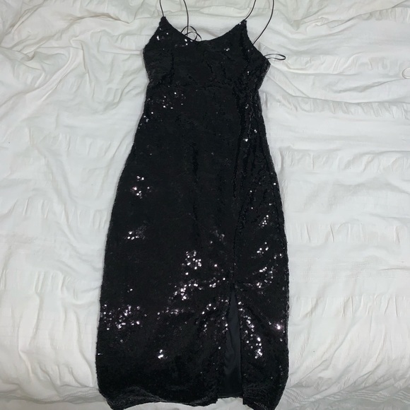 Black sequins party dress. Size xs but fits a bit tighter in the upper chest. - Picture 1 of 4
